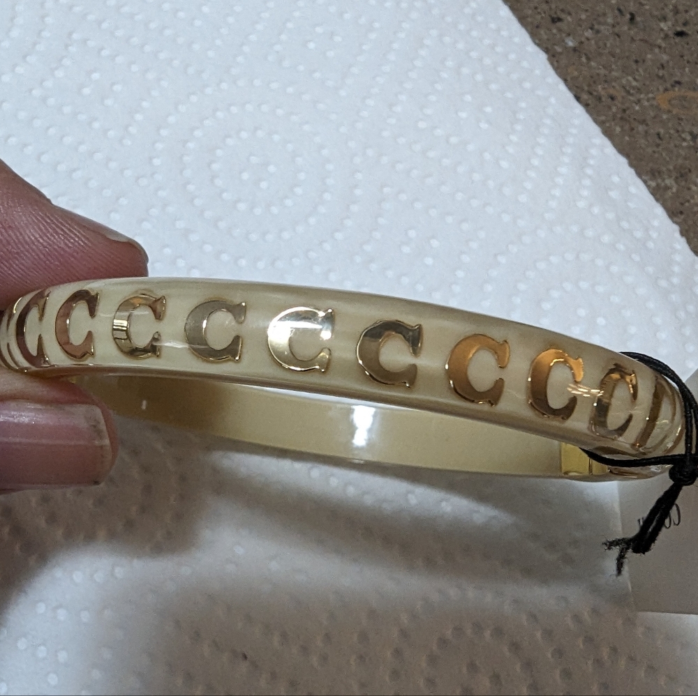 NWT LUCITE CREAM & GOLD COACH BRACELET
ABSOLUTELY SEXY IN SEE THRU - Picture 6 of 11